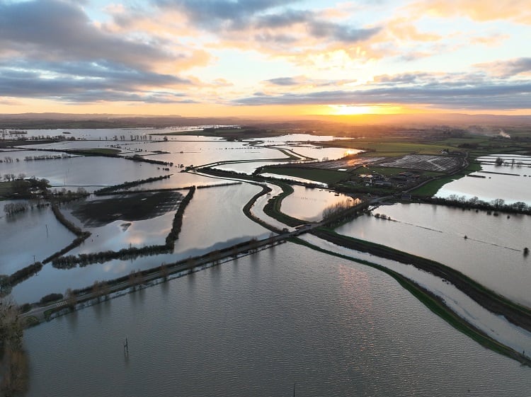 Flooded-farmland-sunset-GettyImages-Andrew-Holt.jpg