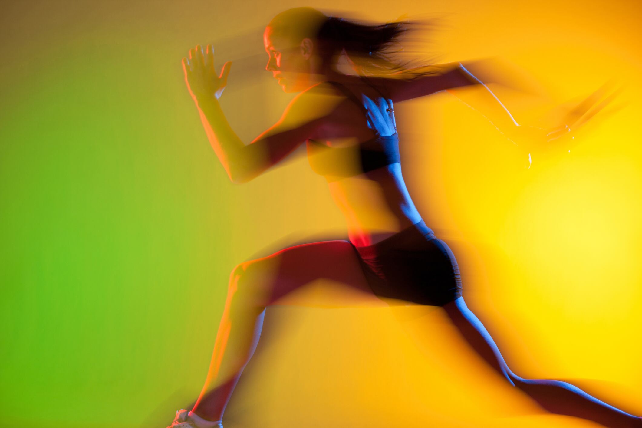 Blurred view of female athlete running