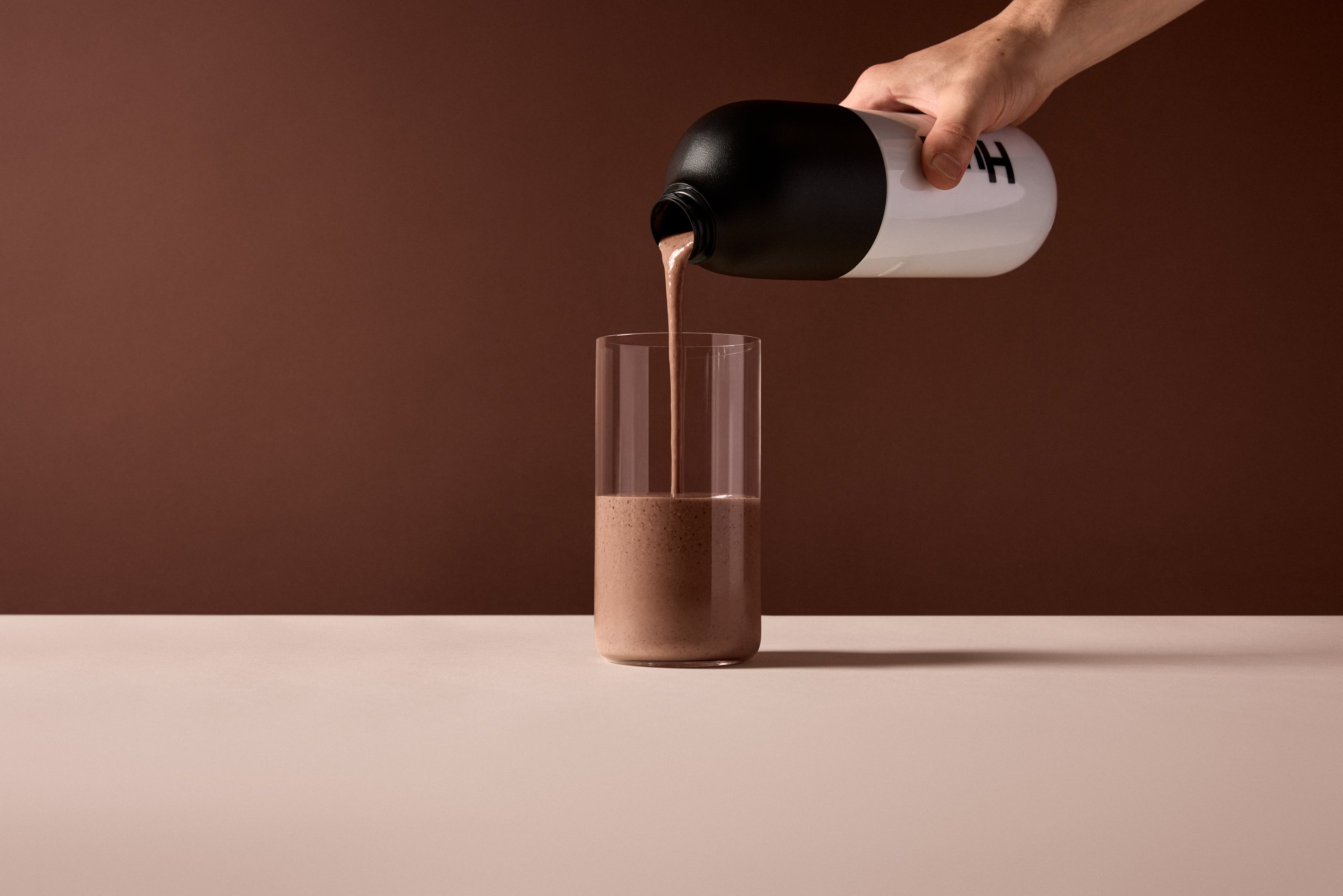 Huel pouring into glass