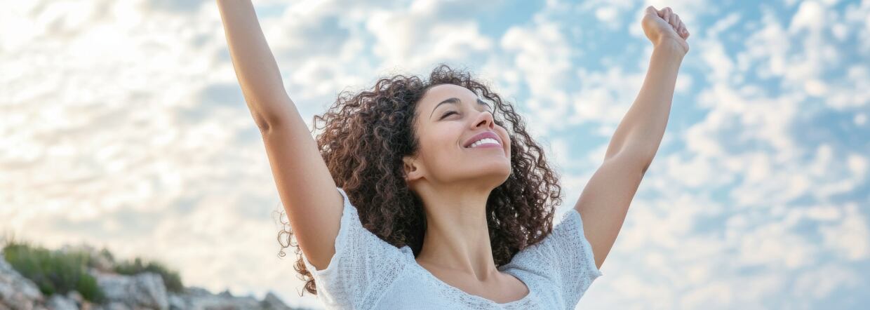 Woman smiling looking at the sky