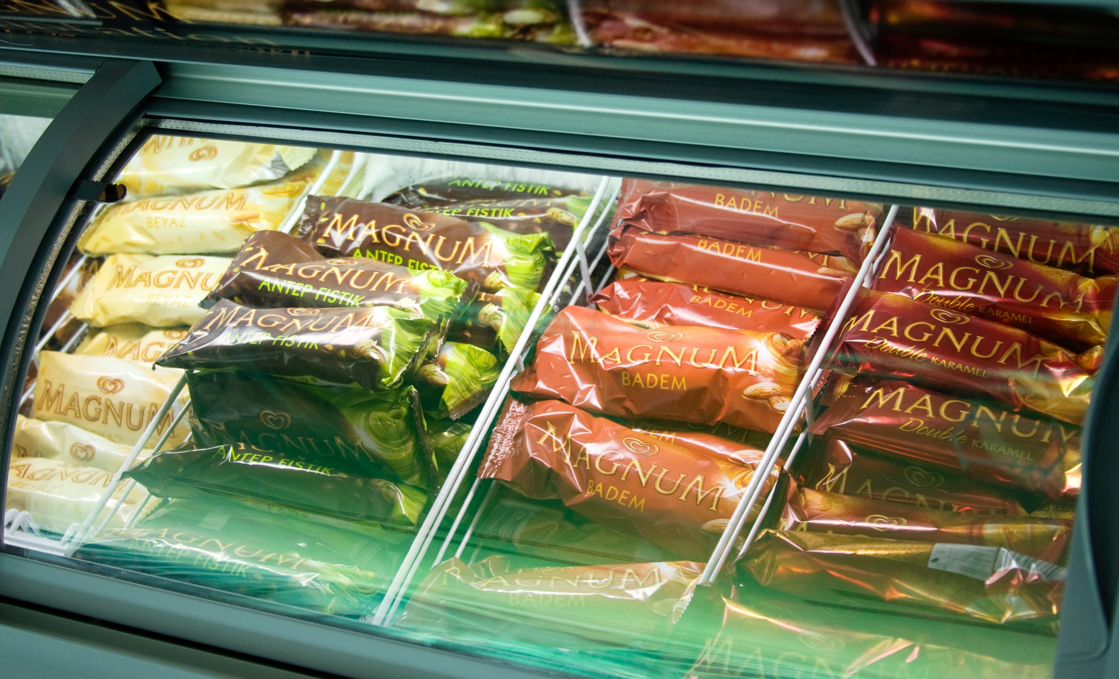 Istanbul, Turkey - July 24, 2011: Various Magnum ice creams in a fridge. Magnum is a famous ice cream brand owned by the Unilever company.