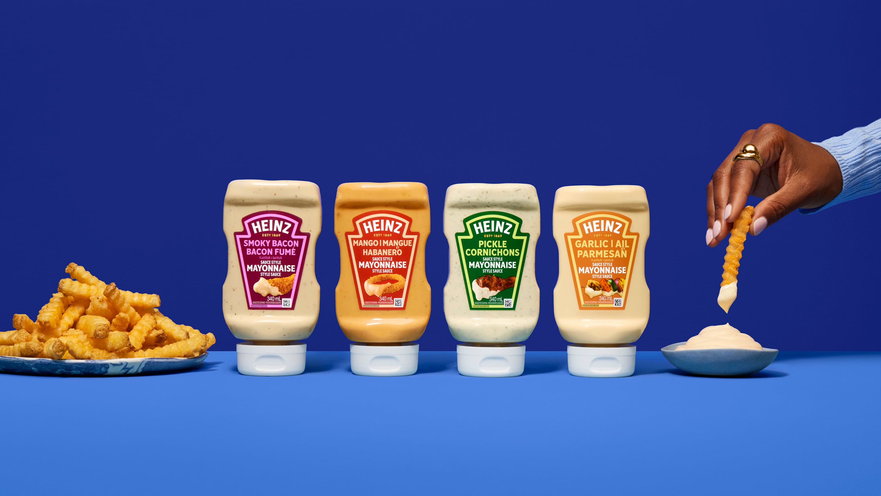 Heinz's new mayo lineup includes Smoky Bacon, Garlic Parmesan, Mango Habanero and Pickle.