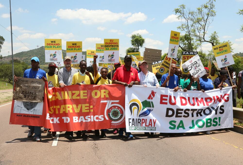Zwelinzima-Vavi-in-red-and-industry-workers-2.jpg