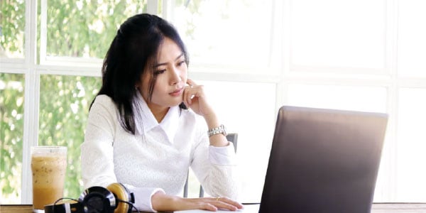 Woman working on her laptop