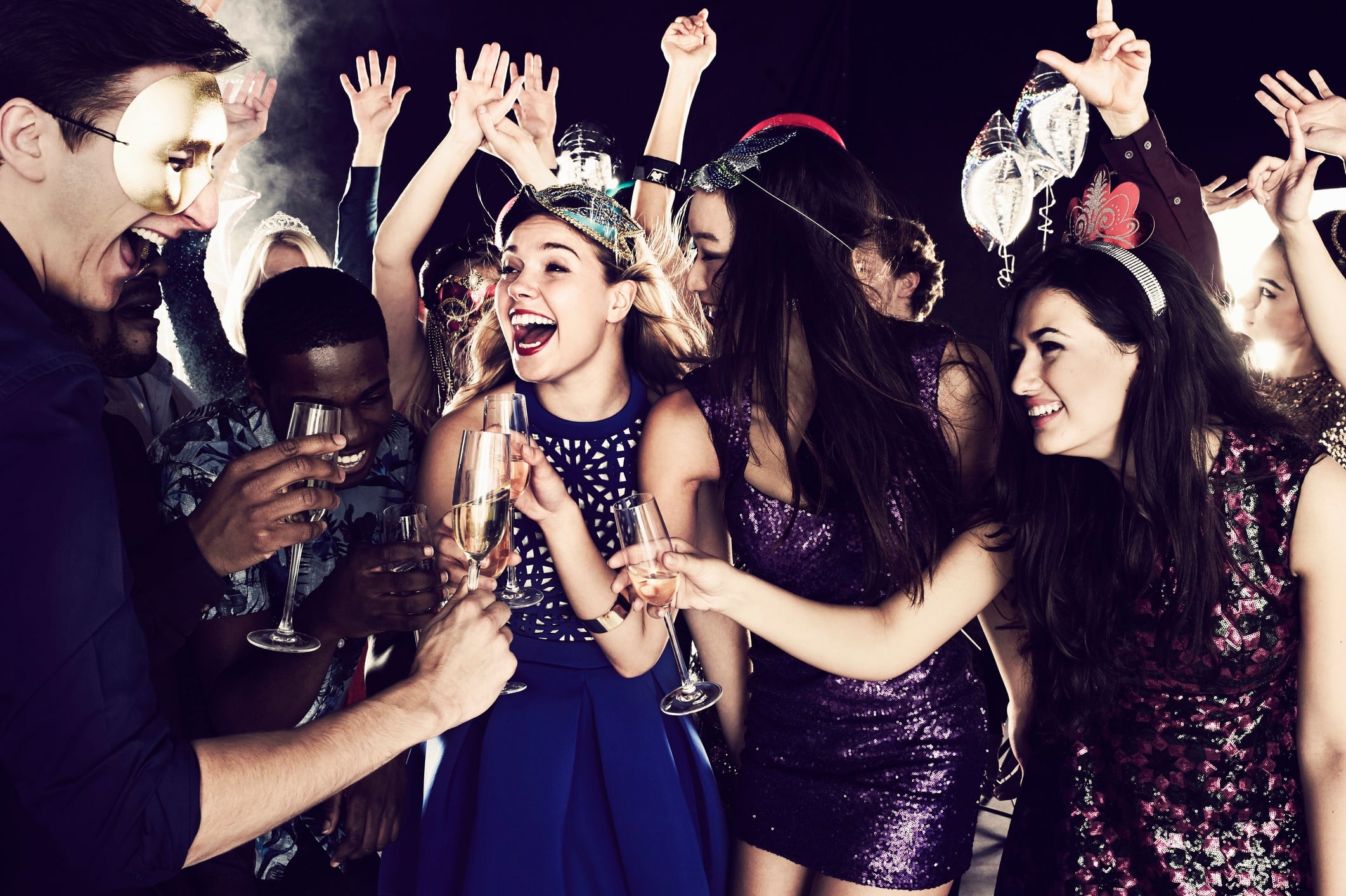 Group of friends dancing and having fun together