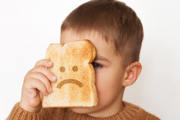 Unhappy-bread-customer-boy-gluten-free-CreativeBird.jpg
