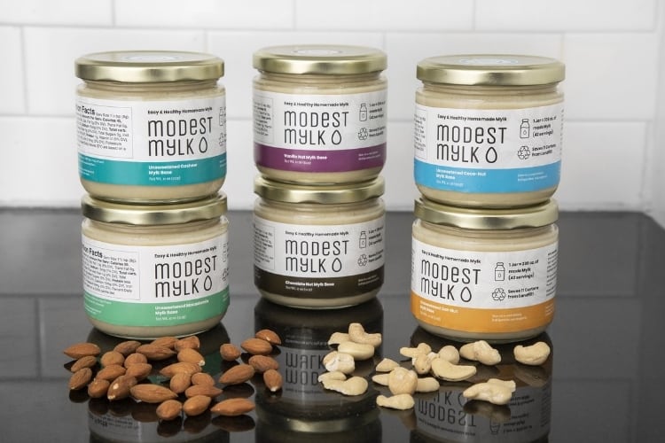 Modest Mylk ditches the carton for sustainable nut beverage bases