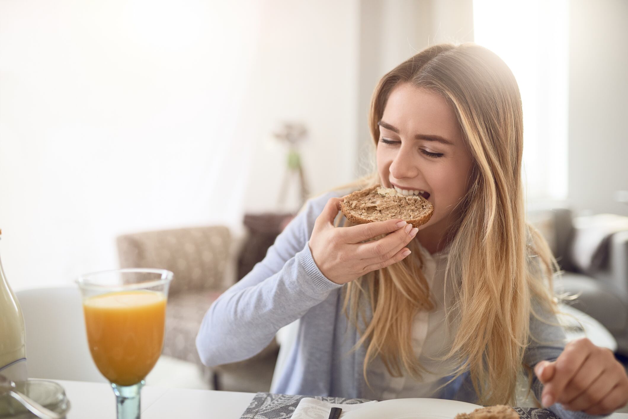 Woman eating healthy breakfast