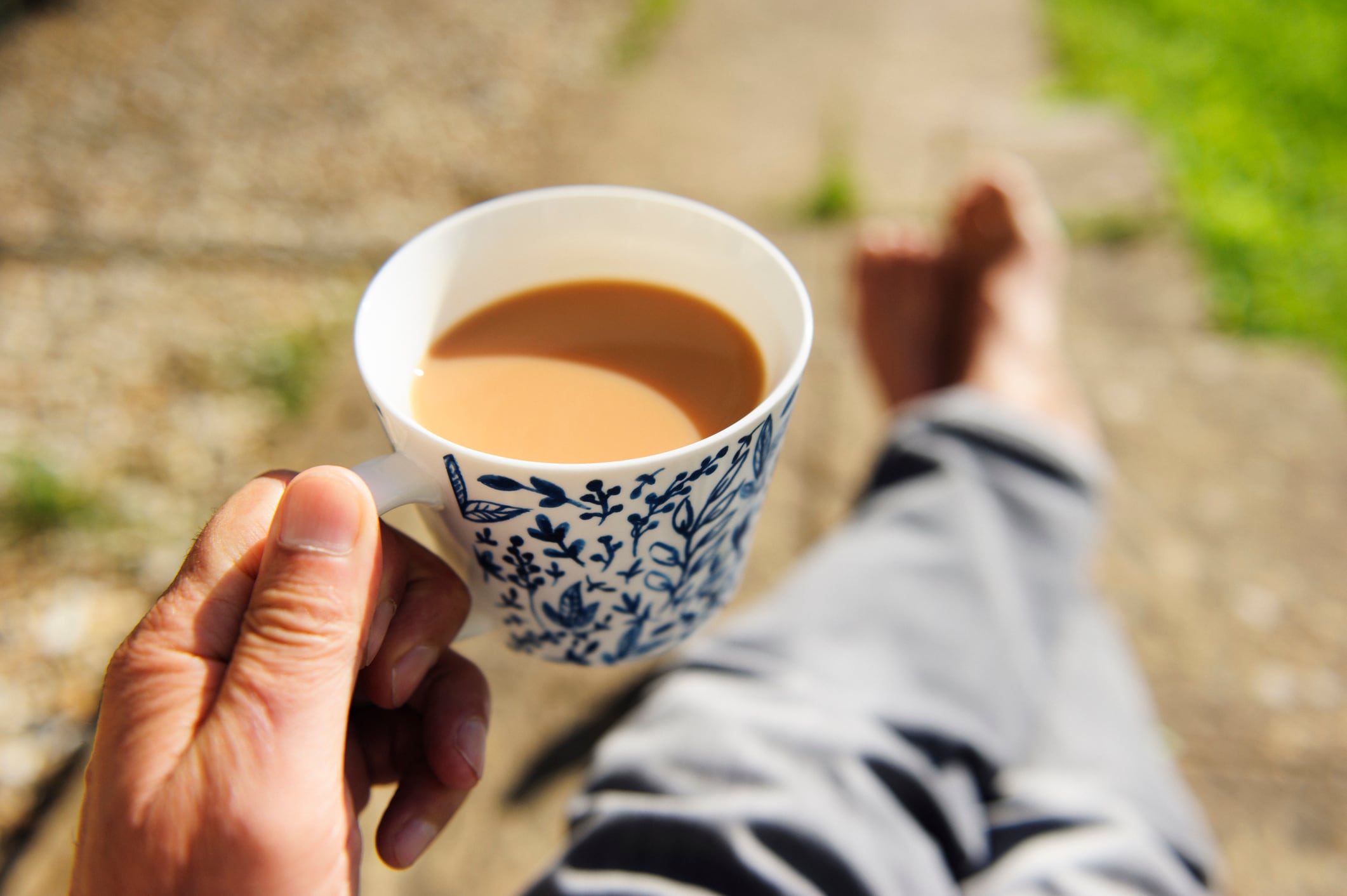 Man holding a cup of tea