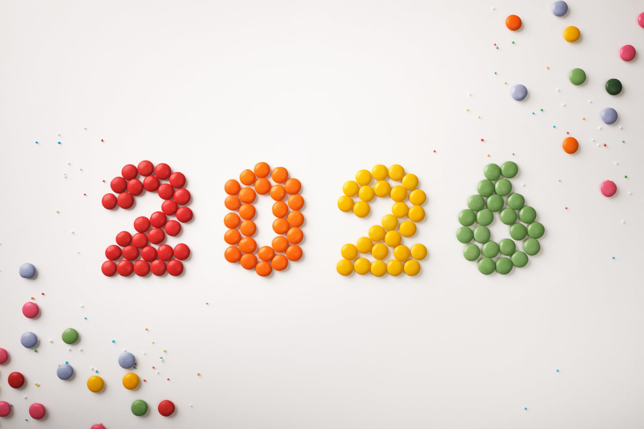 The numbers for the new year 2026, made from colorful sweets on a white background.