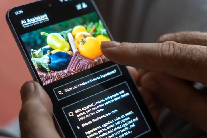 Man using smart assistant or AI agent for cooking and preparing food