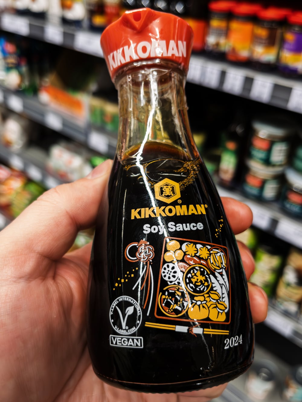 Kikkoman soy sauce brand representing Japanese fermentation expertise and global reach.