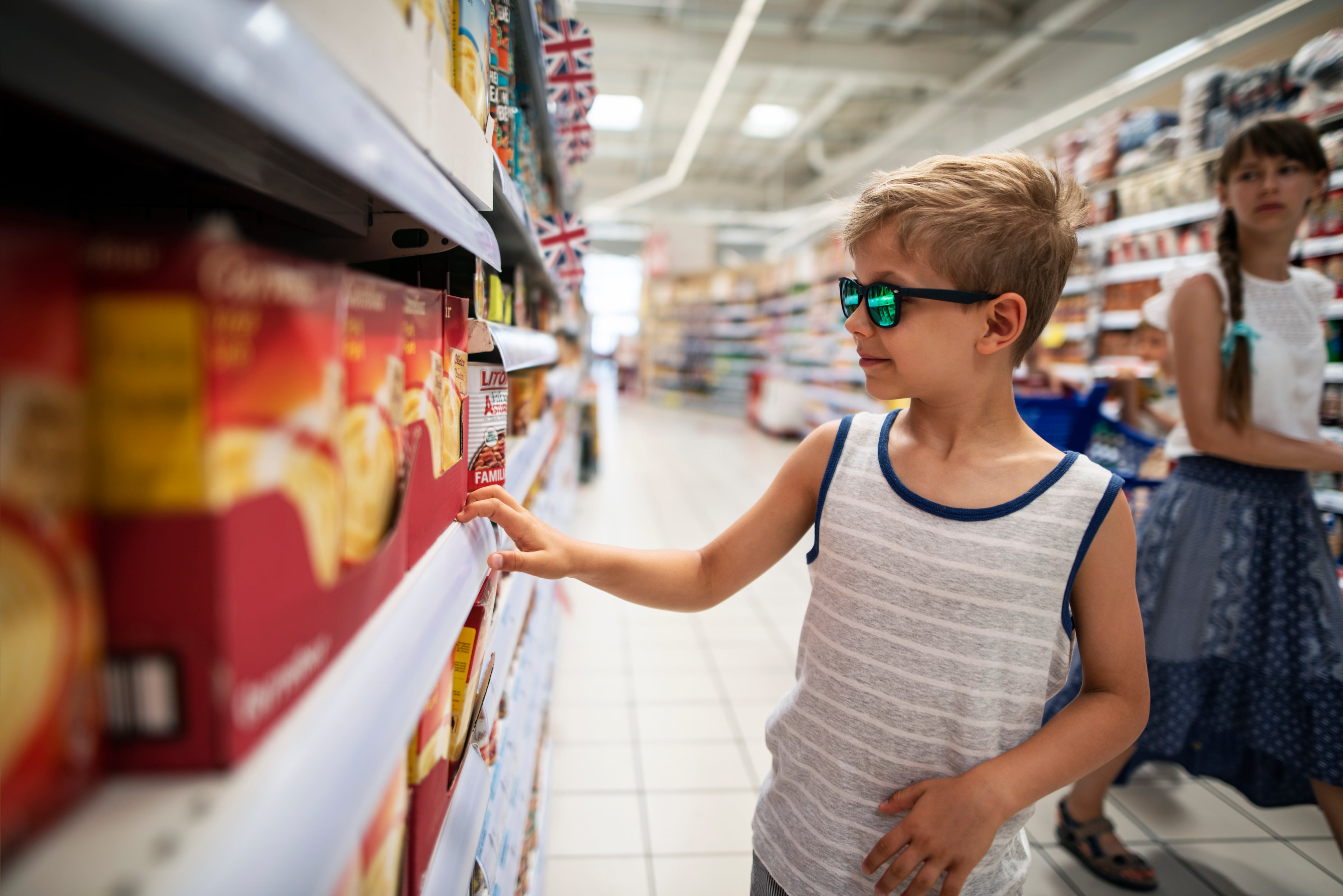 Boy looking at products on shelf