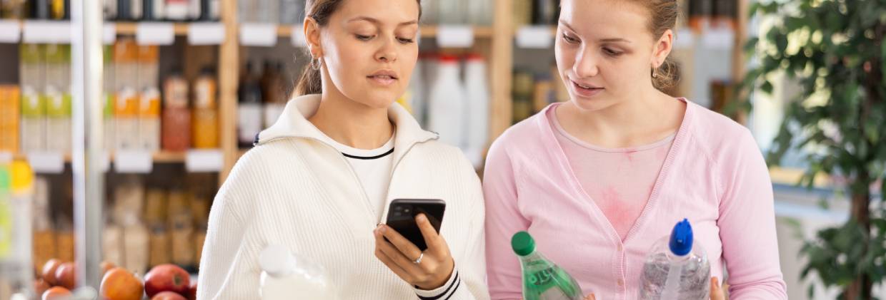 two women looking at labels