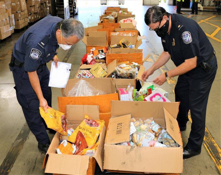 CBP-seizes-19-555lbs-of-prohibited-pork-chicken-beef-and-duck-from-China.jpg