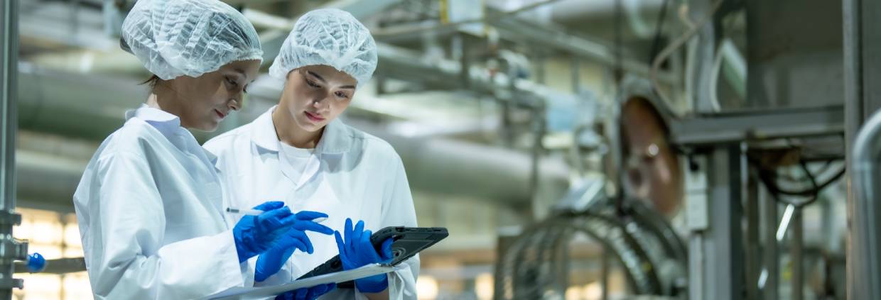 two women in manufacturing lab
