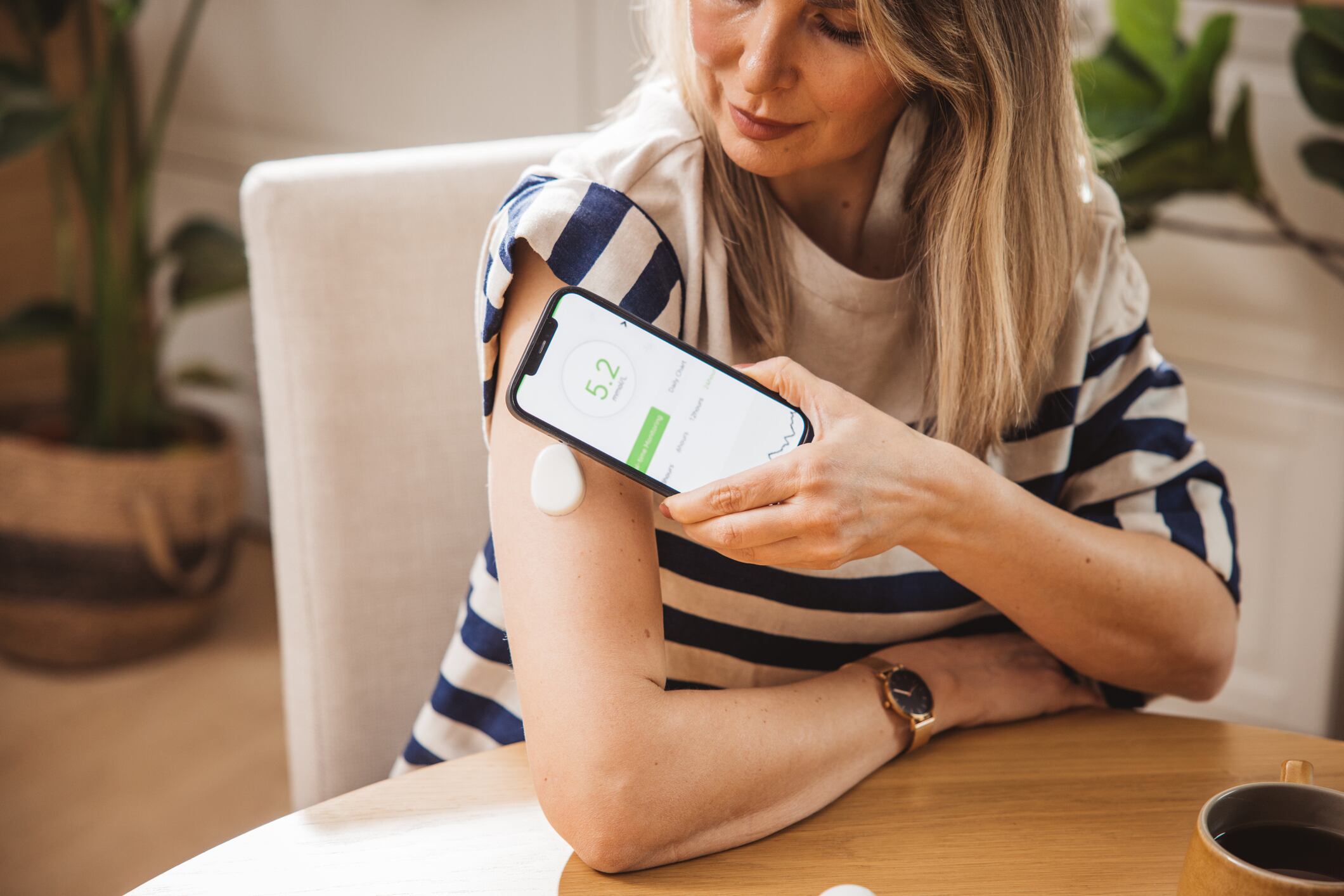 Woman using CGM