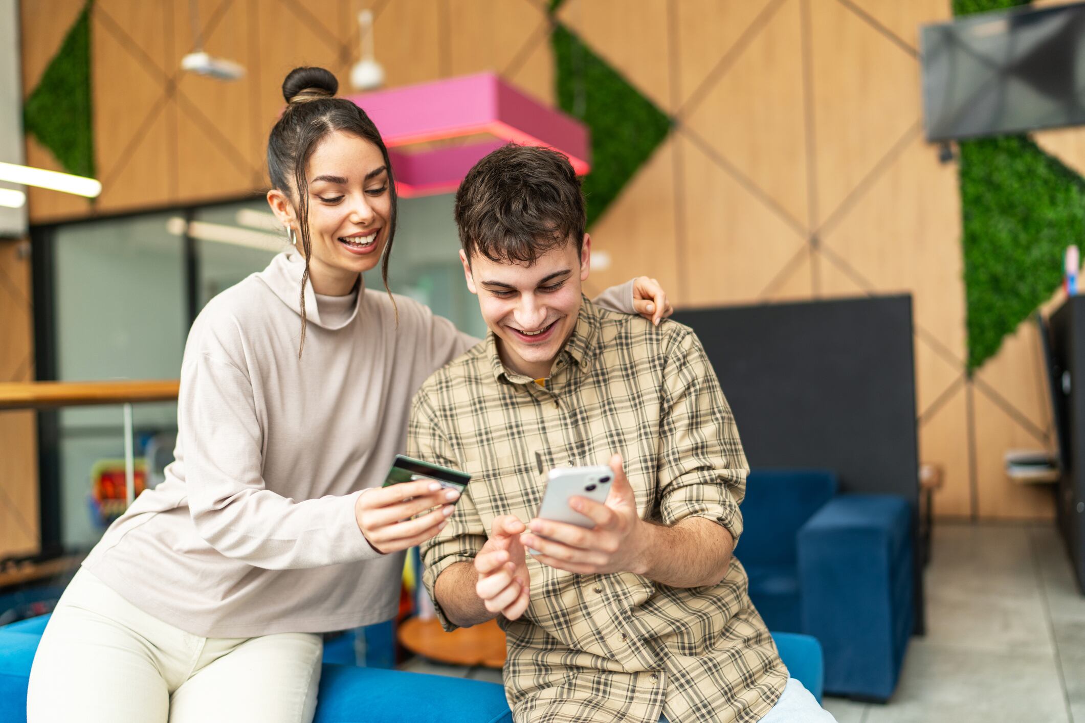 A businessperson interacting with a futuristic digital interface showing AI tools and product recommendations