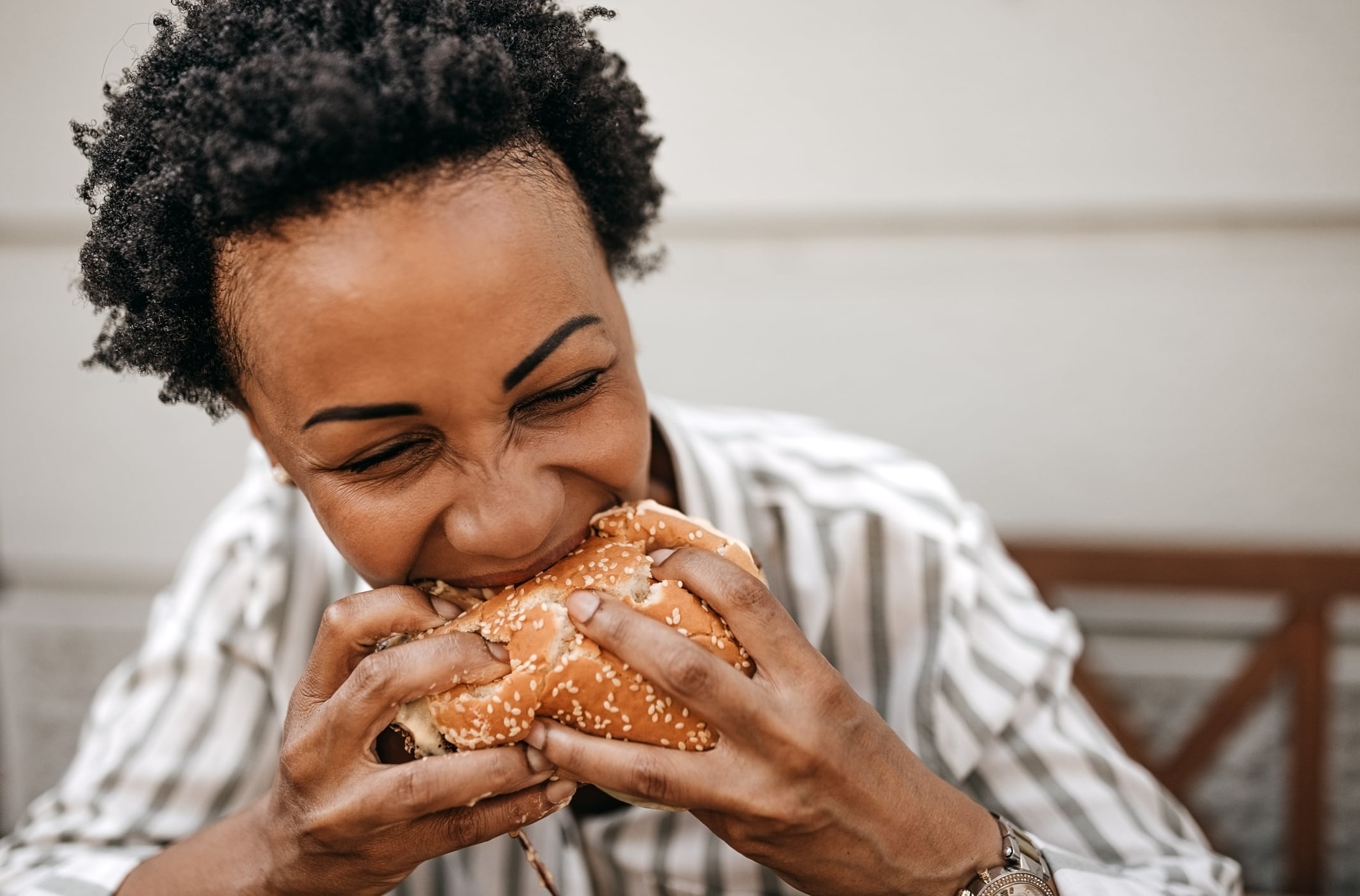 Woman eating burger