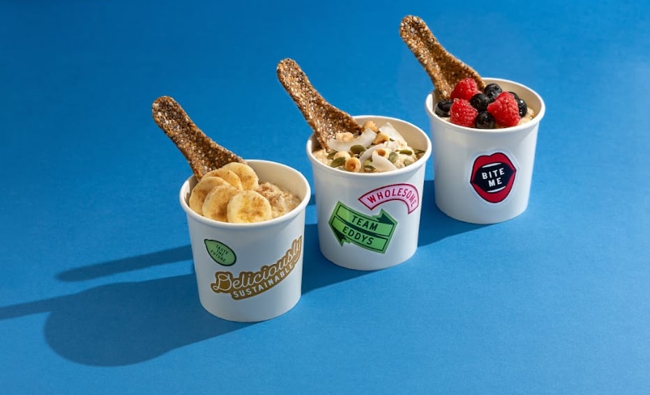 Eddys edible spoon made from grains and seeds used with a dessert.