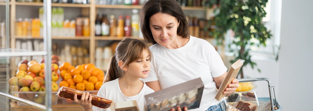 Woman and child looking at product