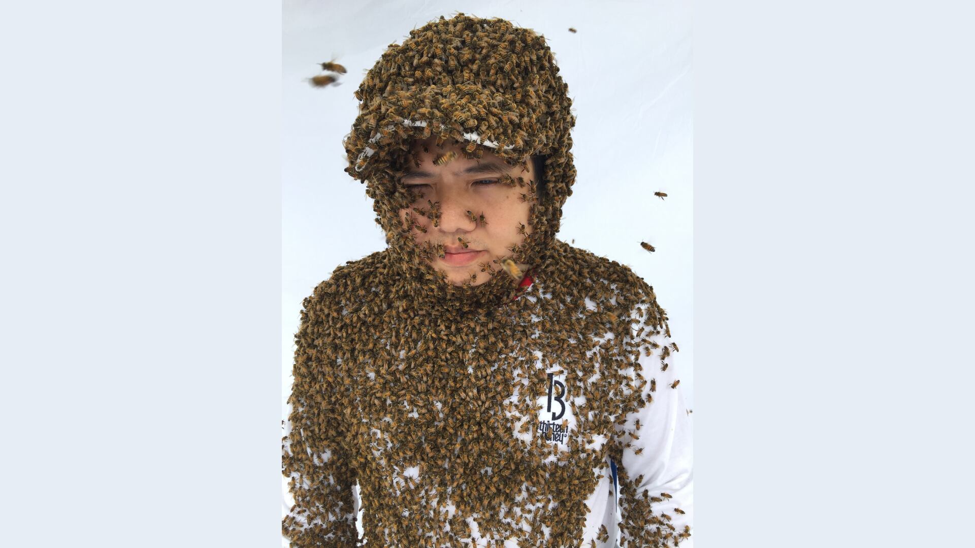 Stingless Bee Factor founder Javier Lau with his bee colony. Lau is an apiculturist passionate about promoting the stingless bee honey industry.