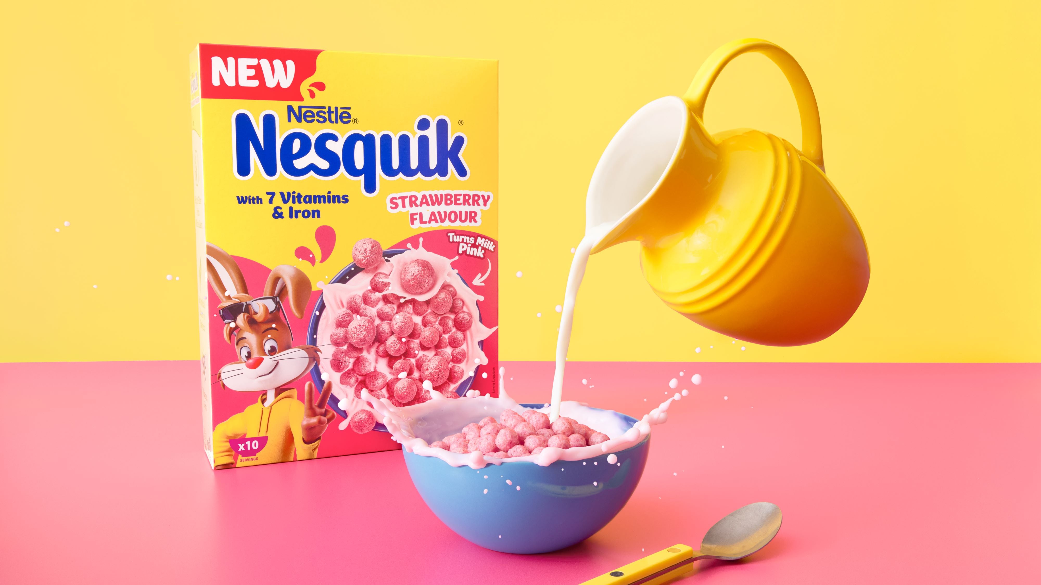 Nesquik Strawberry cereal turning milk pink in a breakfast bowl