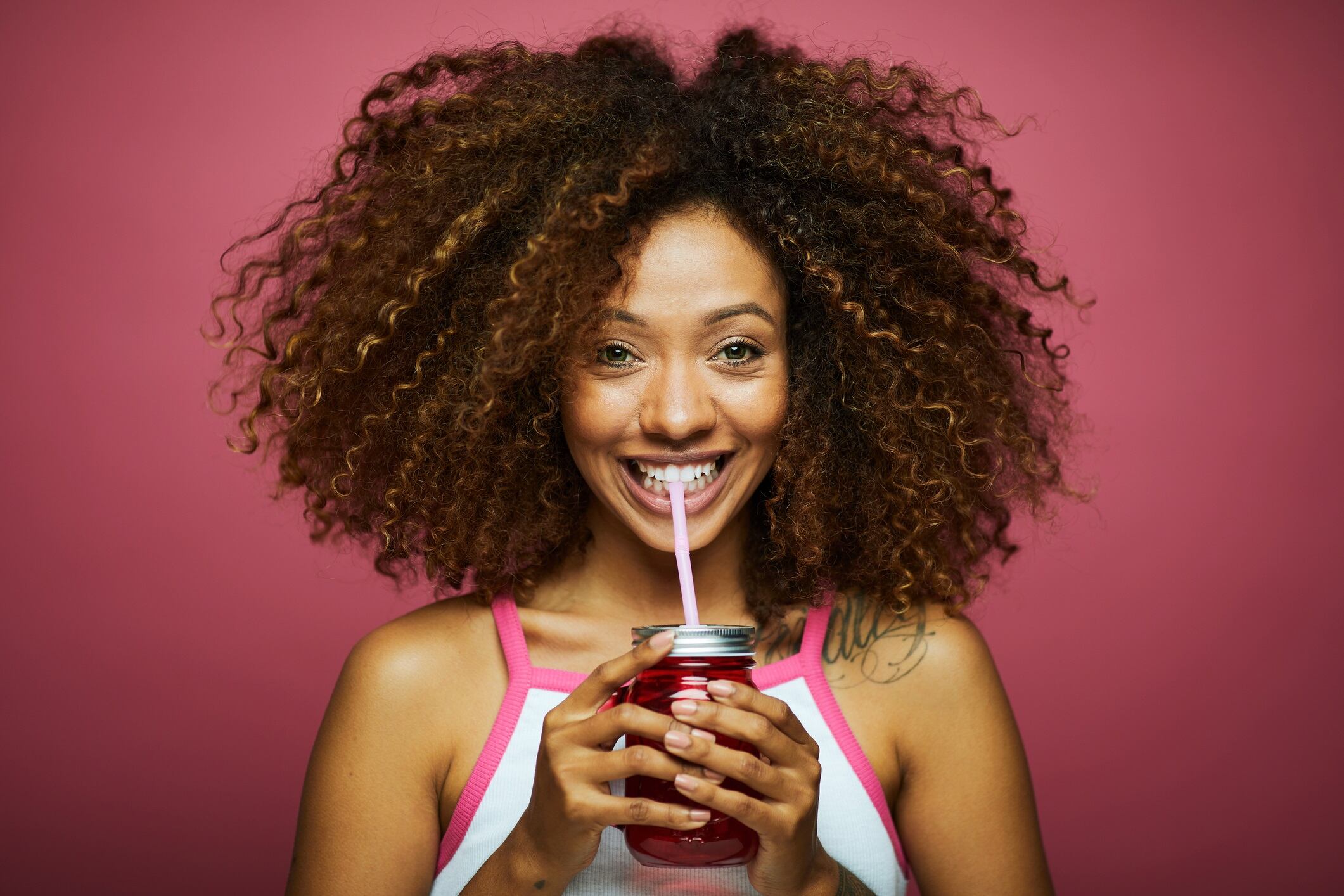 Beautiful young woman with afro hair in summer themes.
Made in Barcelona with model from Venezuela.