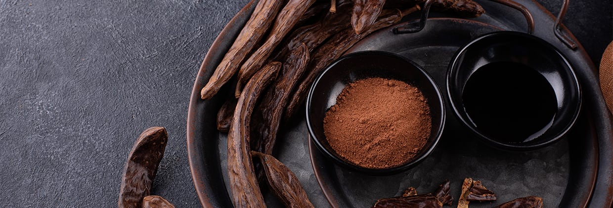 Carob pods, powder and molasses or syrup. Organic natural cocoa substitute