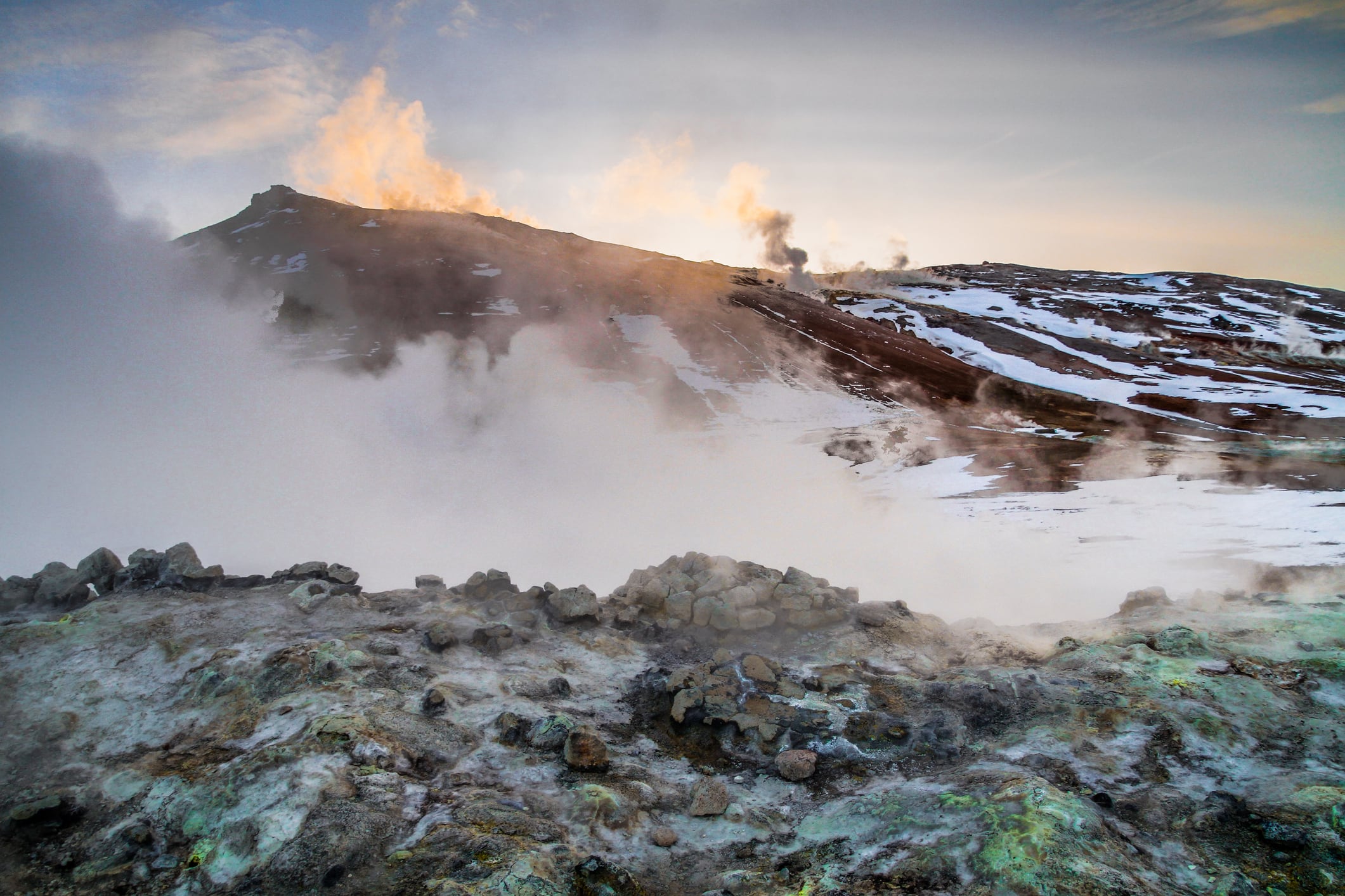 Northeast Iceland. Mud pots are boiling, the ground is multicolored and cracked. Hverarondor Hverir geothermal area in the north of Iceland near Lake Myvatn.