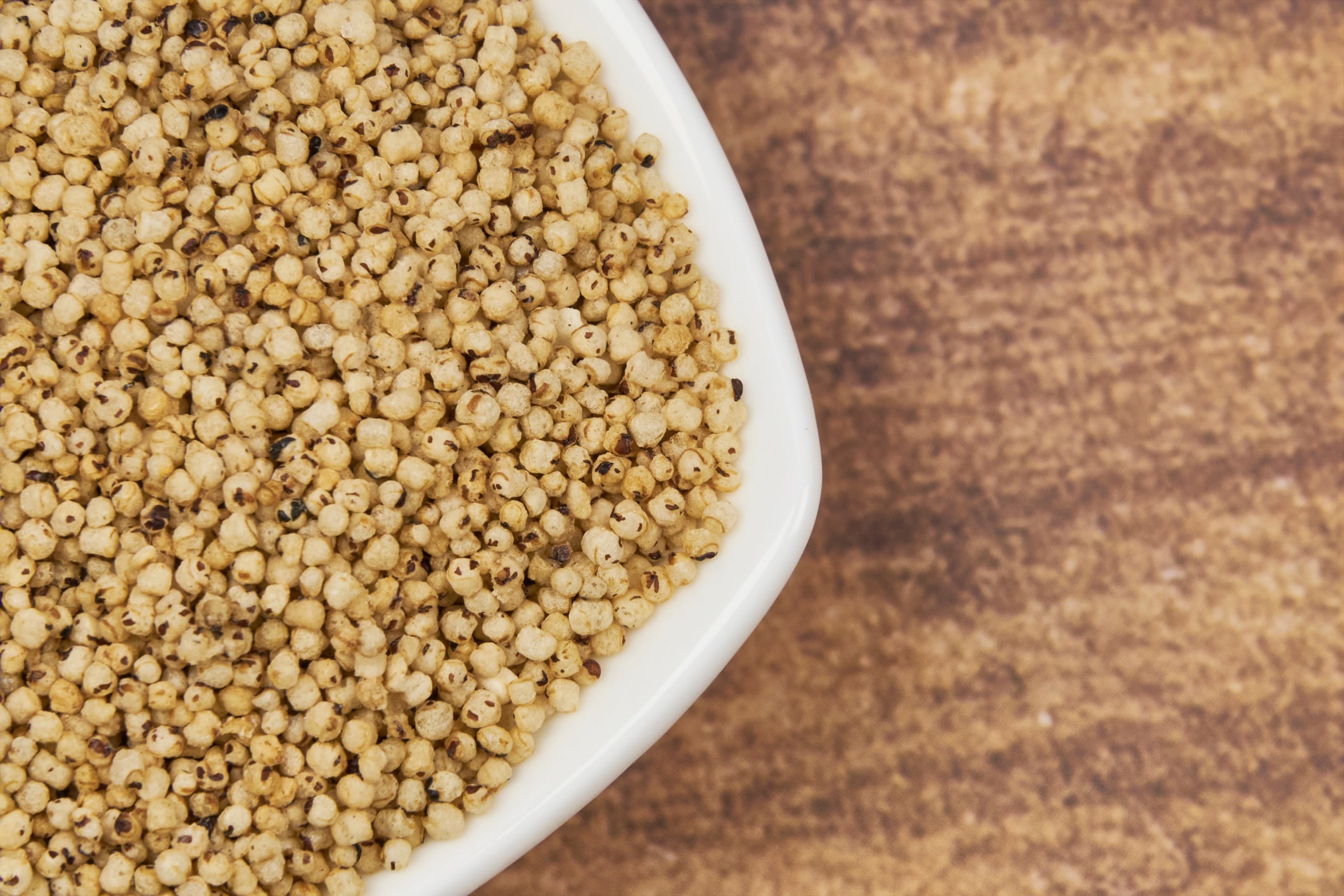 Whole grain concept. Toasted kañiwa. Ingredients for a healthy and fortifying breakfast, a healthy diet, with selective focus.