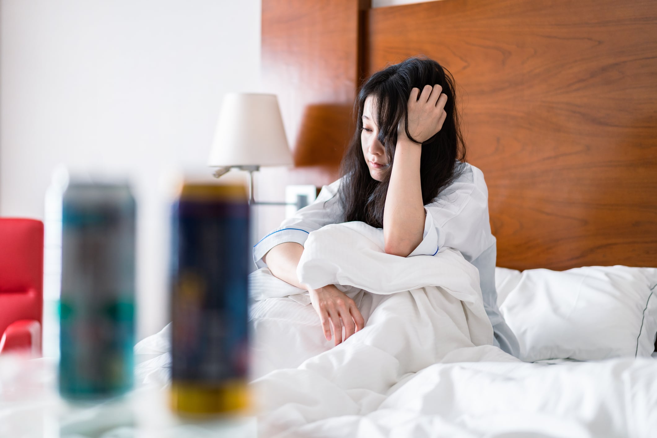Young woman suffering from hangover