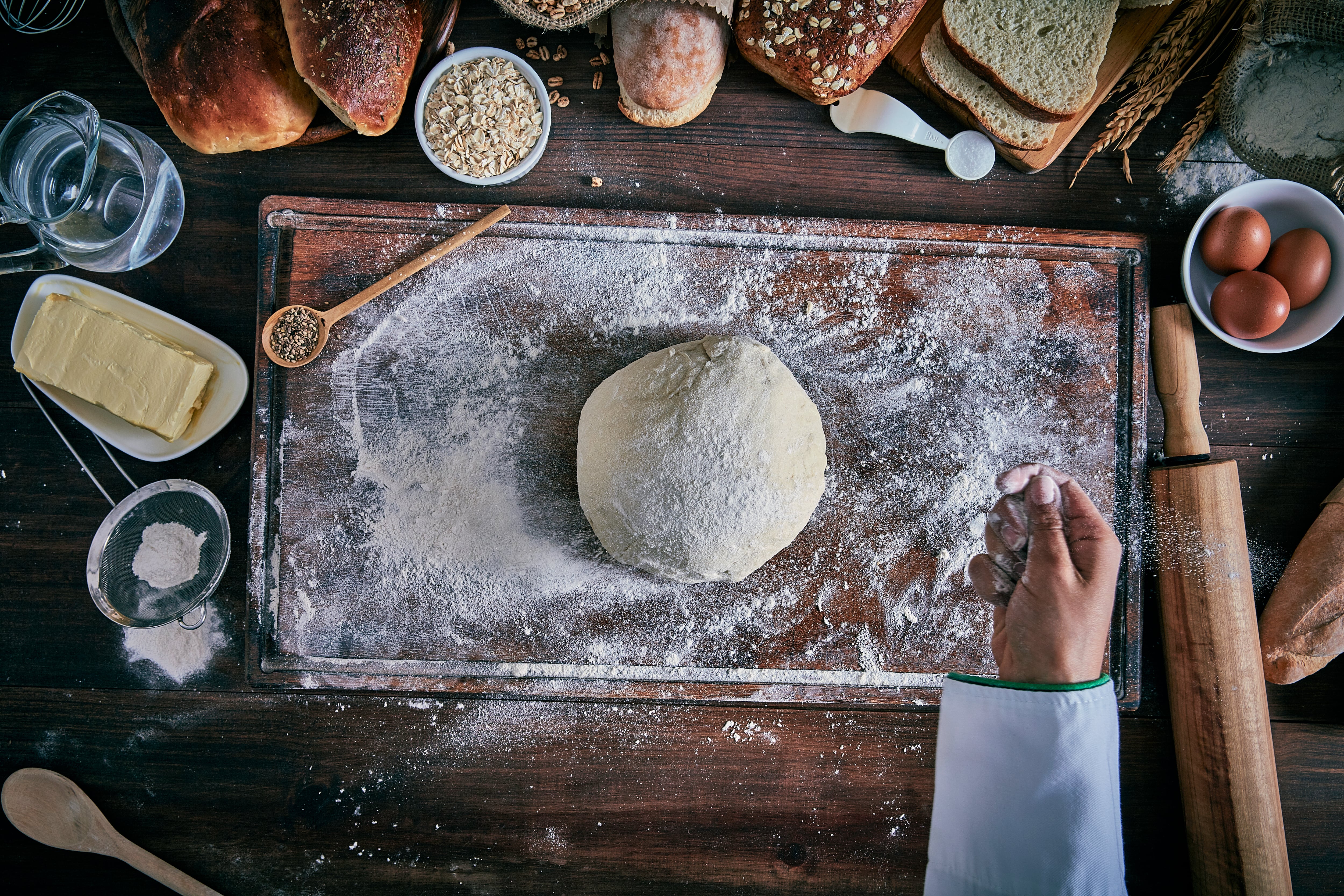 Chef kneading dough