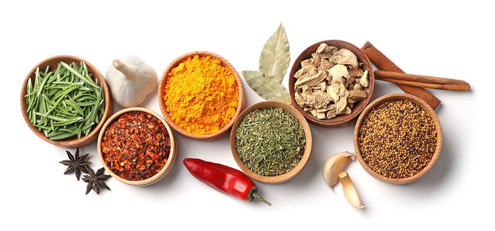 Composition-with-different-aromatic-spices-on-white-background.jpg