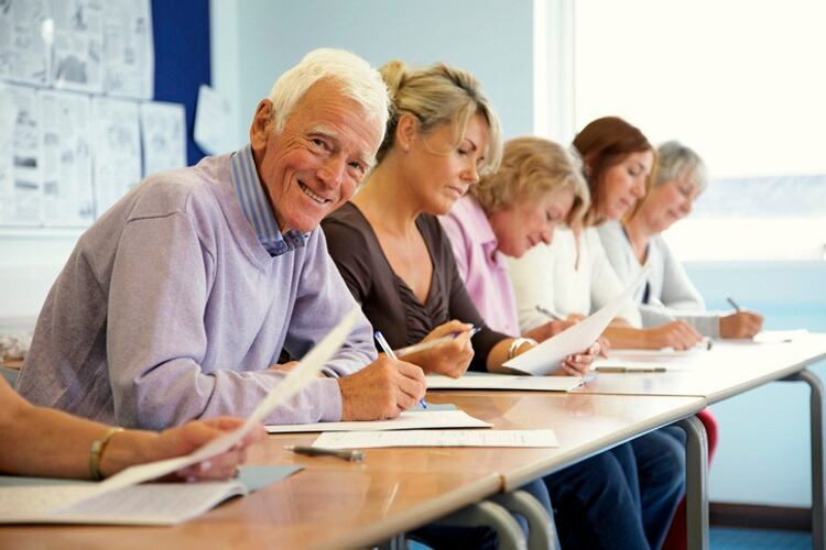 Senior-man-sitting-in-classroom-Abelimages.jpg