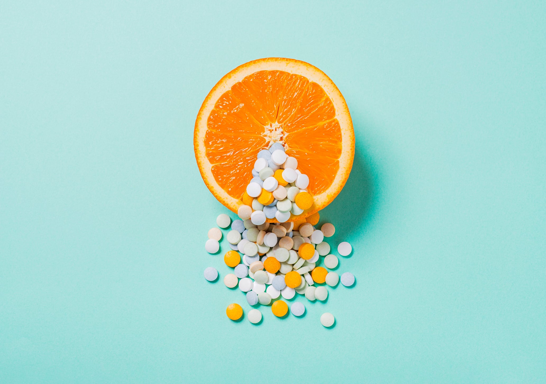 Medicine coming out of an orange
