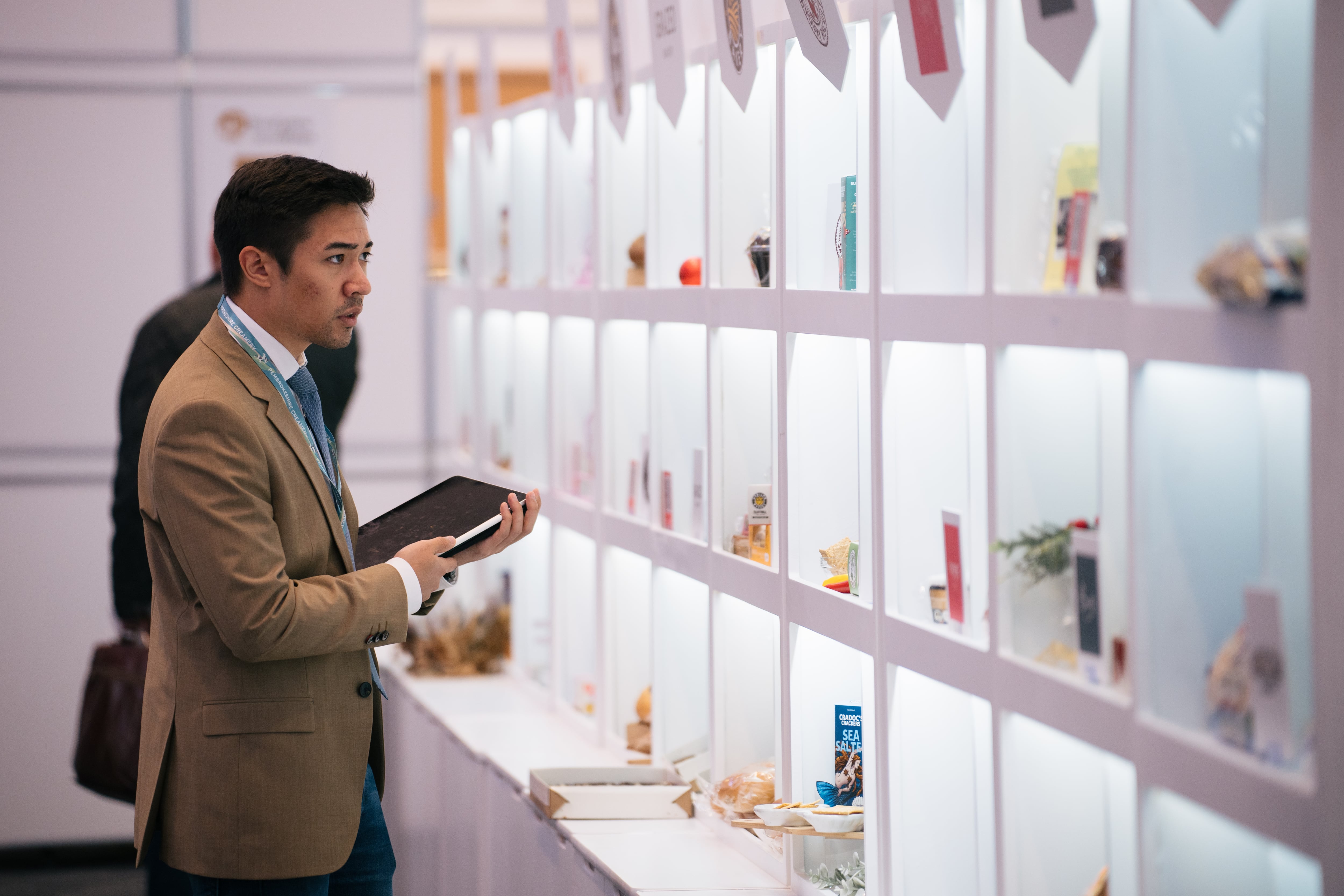 man looking at products