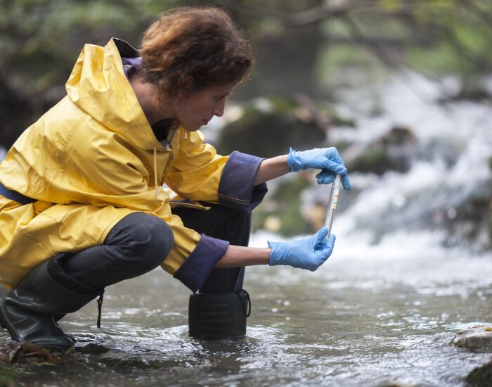 GettyImages-CasarsaGuru-water-testing-test-biologist-stream.png