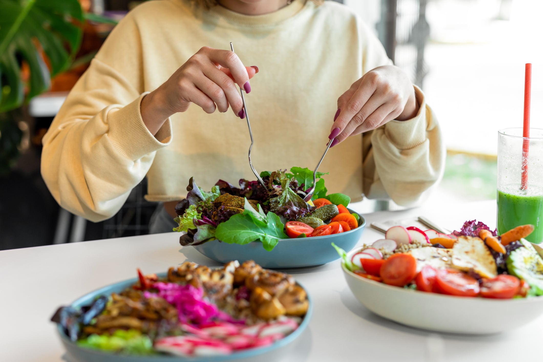 Woman eating healthy salad