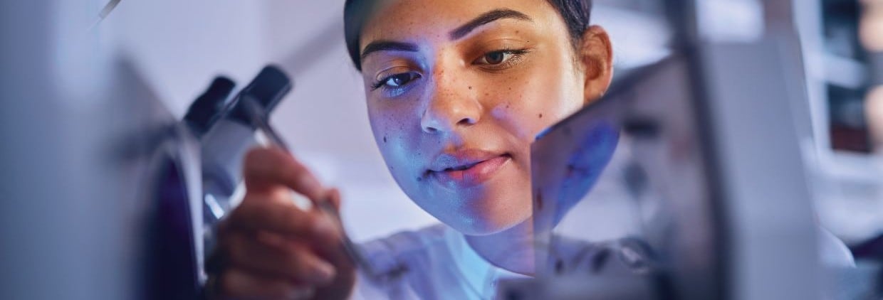 Woman in lab reformulating F&B