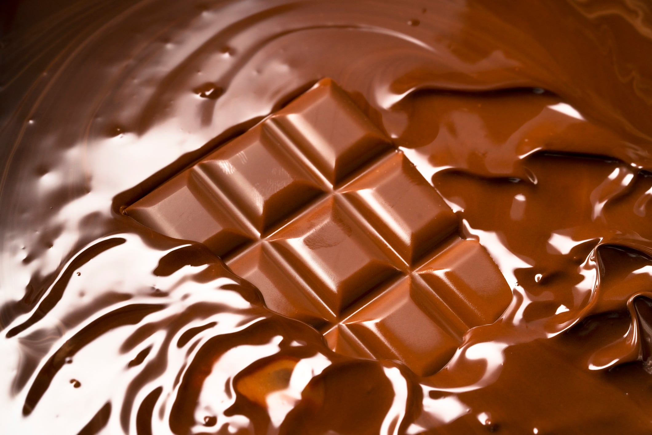 Melting chocolate bar. Chocolate sauce.