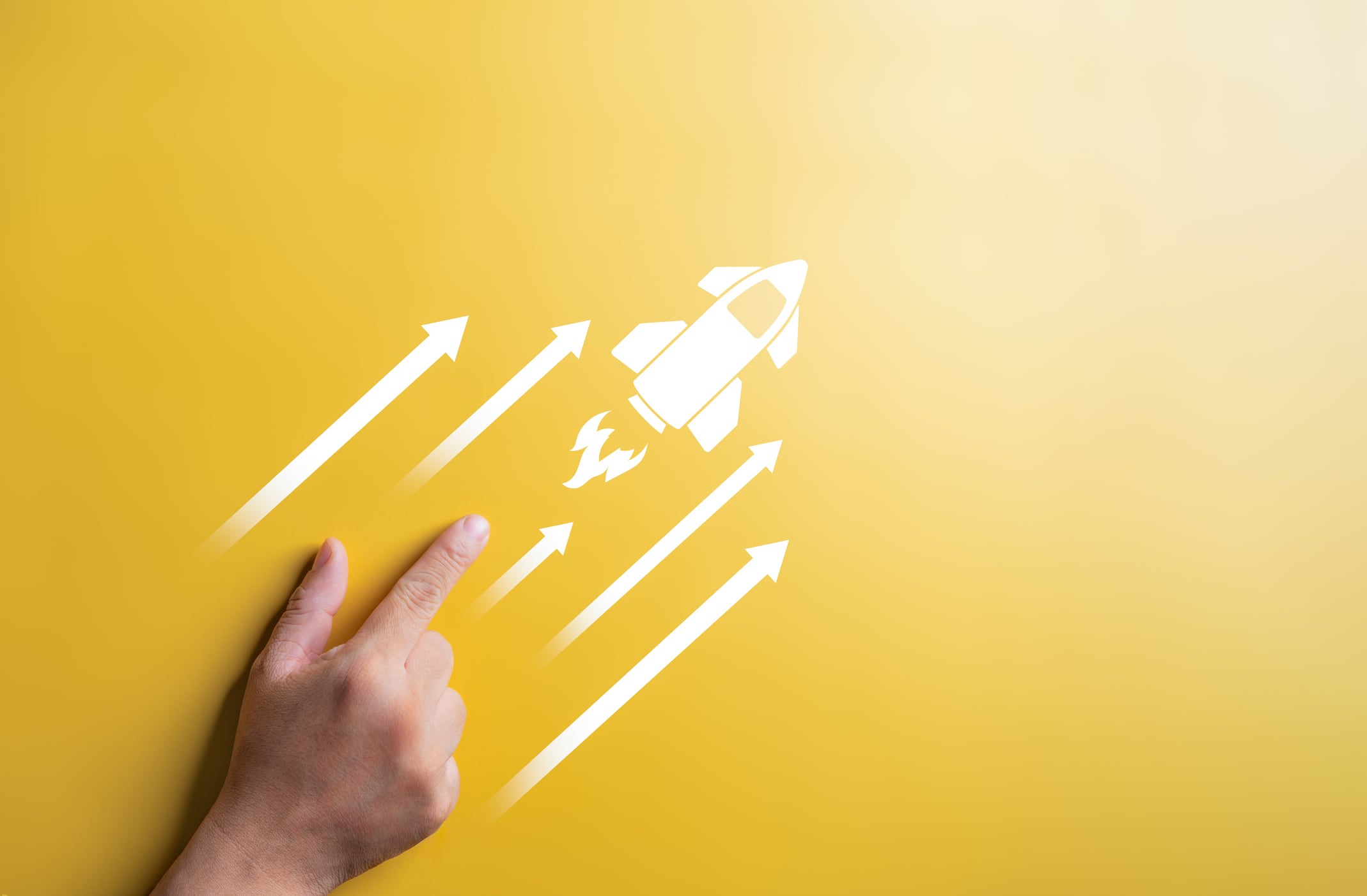 Start up idea, Starting new project concept. Hand pointing with a rocket launch and arrow icons. Business strategy for goal target success. Planning development leadership and customer target group.