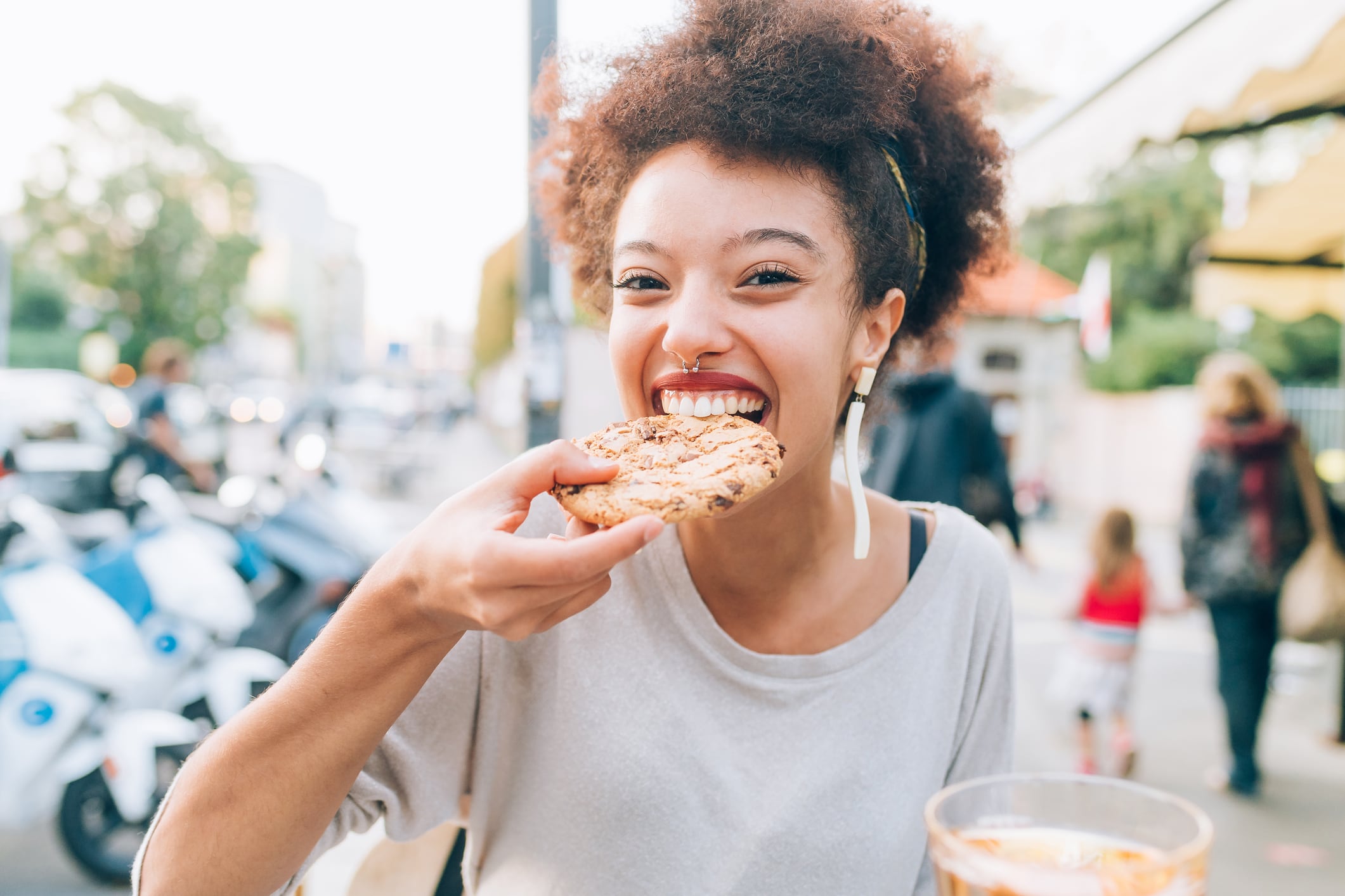 Woman eating cookie