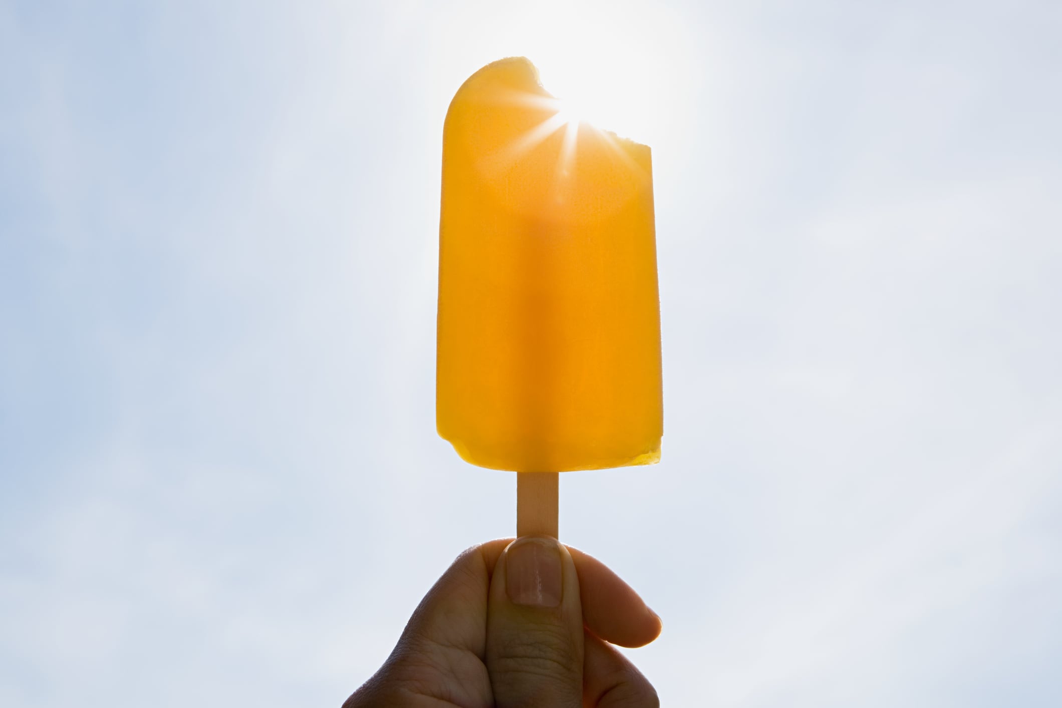 Ice lolly in front of the hot sun