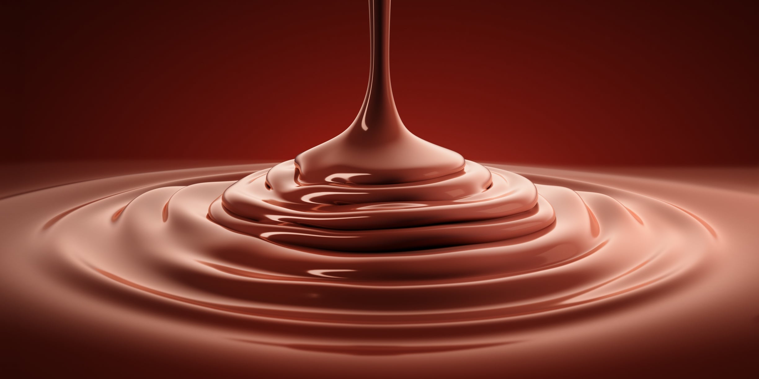 Close-up of pouring liquid chocolate.