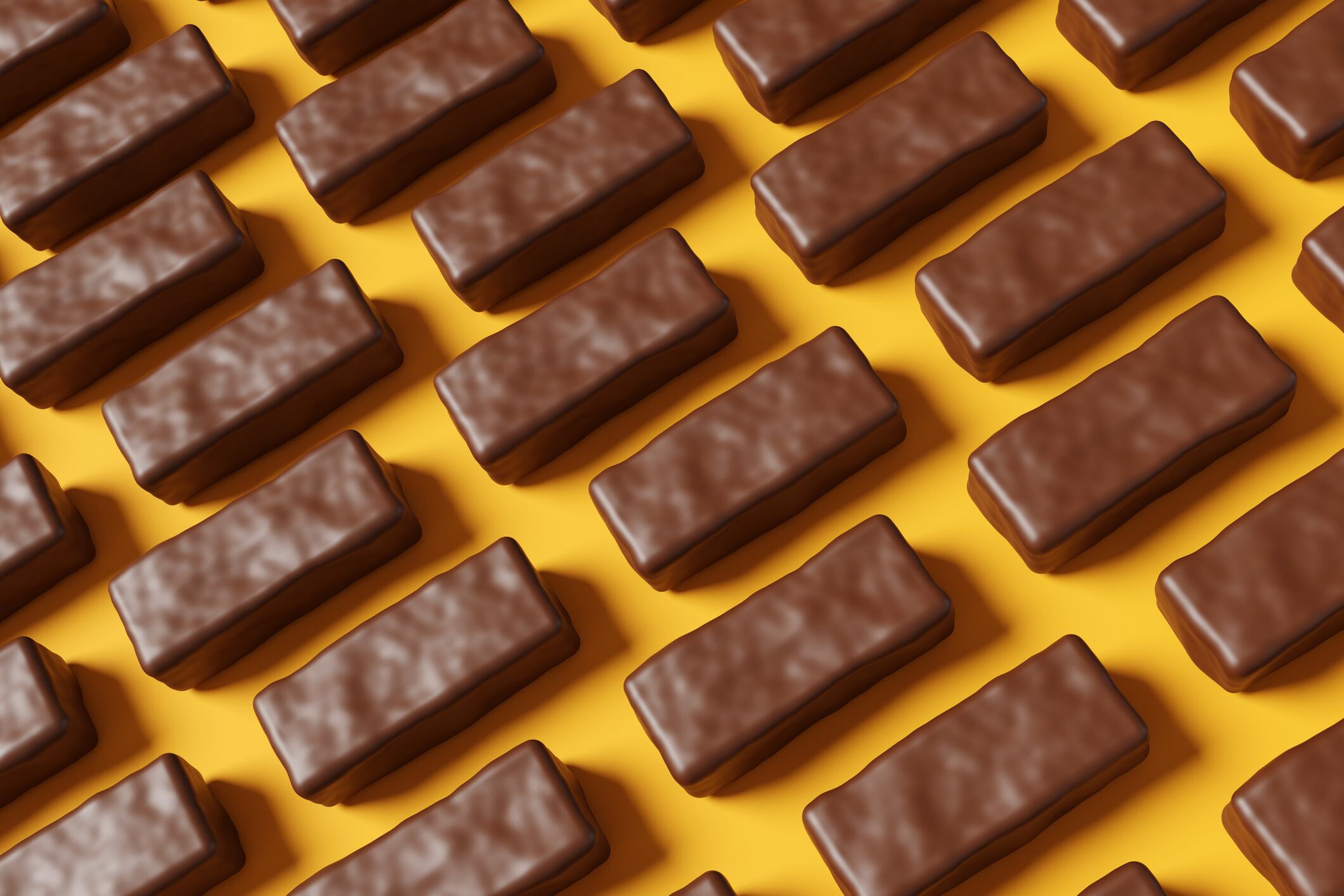 Chocolate bars on a yellow background.