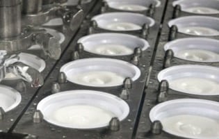 chobani-history-filling-cups.jpg