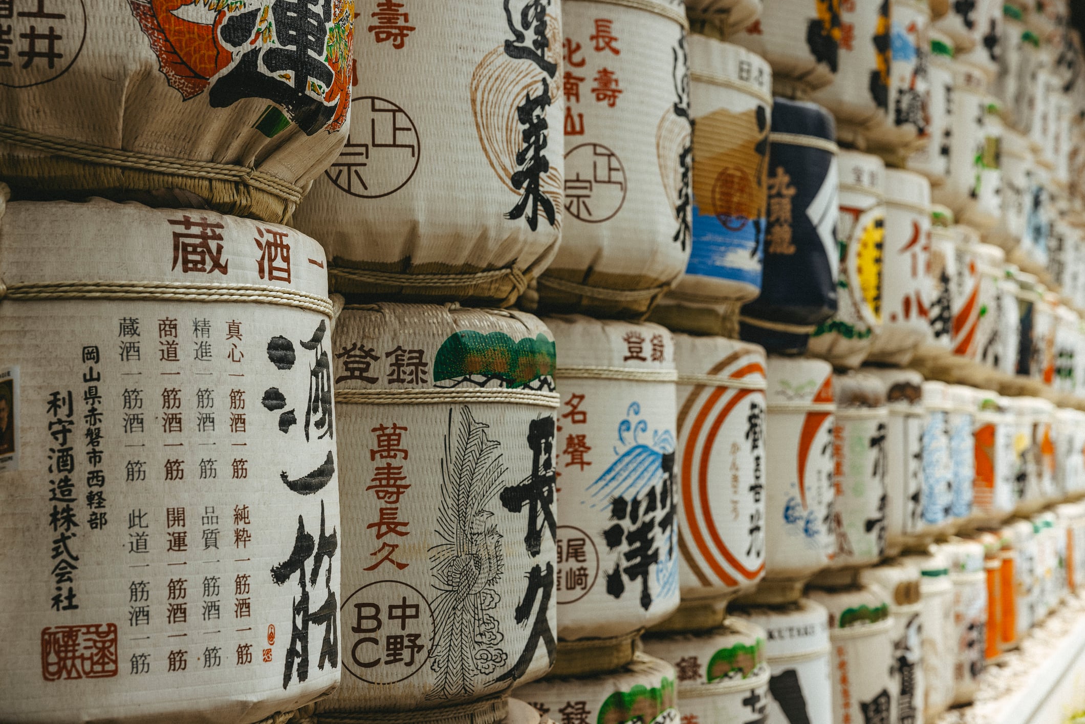 Tokyo, Japan-April 29,2024: colorful sake barrels at the Meiji Jingu Shrine