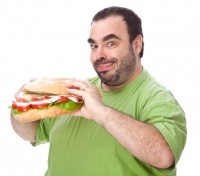 Man eats enormous roll iStock free