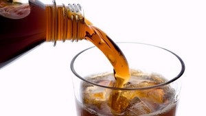 Drinking a high amount of soda or other sugary drinks could mean children eat more unhealthy foods like pizza and sweets, say the researchers.